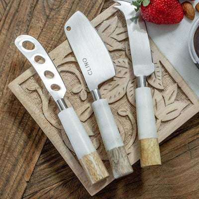 timber and marble cheese knife set on cheese board