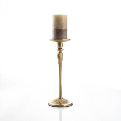 Clinq brass candlestick with pillar candle