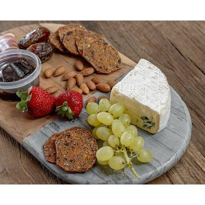 Clinq timber and marble cheese board with food