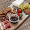 Clinq timber and marble cheese board with food