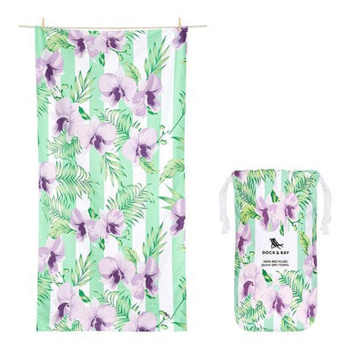 botanical towel with purple flowers and green stripes with carry bag